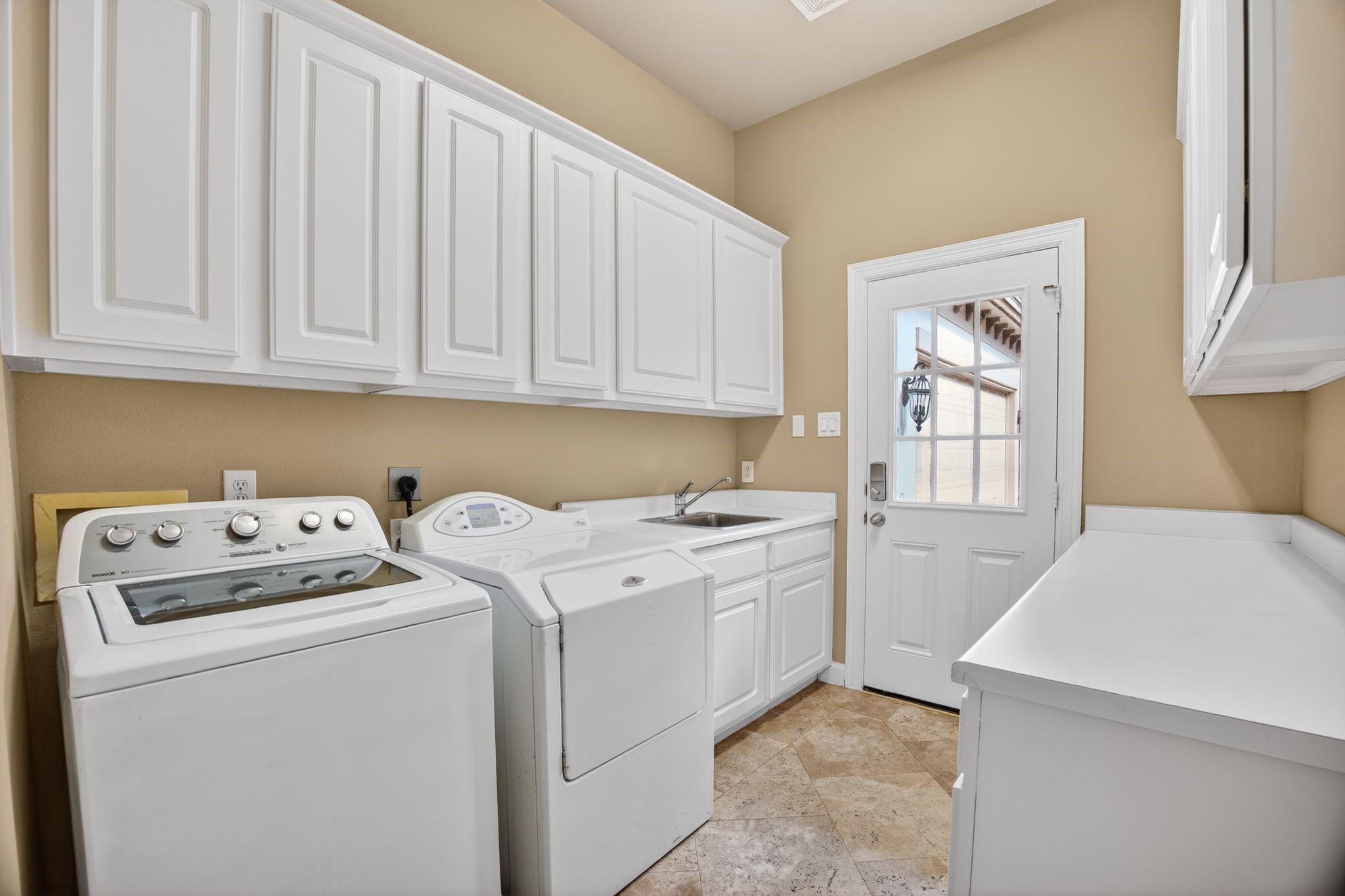 11511 Gallant Ridge Lane Houston, TX 77082 - Photo 45 of 49 a utility room with dryer and washer