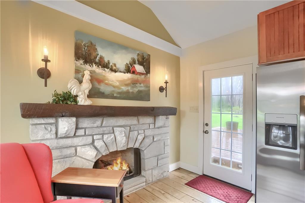 316 Denny Road Valencia, PA 16059 - Photo 13 of 49 Take a seat by the stone fireplace and select your favorite recipe.