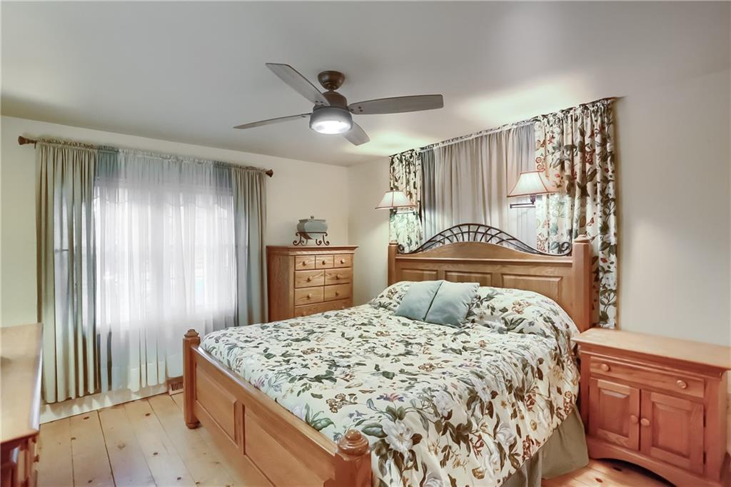 316 Denny Road Valencia, PA 16059 - Photo 22 of 49 This bright and airy bedroom features a ceiling fan.