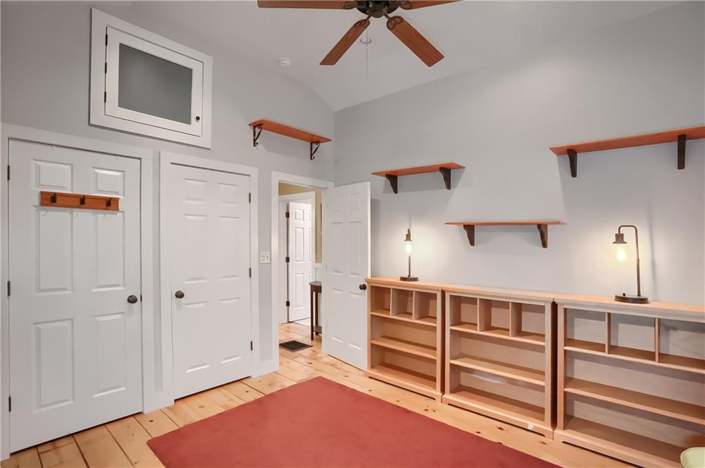 316 Denny Road Valencia, PA 16059 - Photo 28 of 49 The soaring ceiling draws your eyes to the shelving and unique storage.