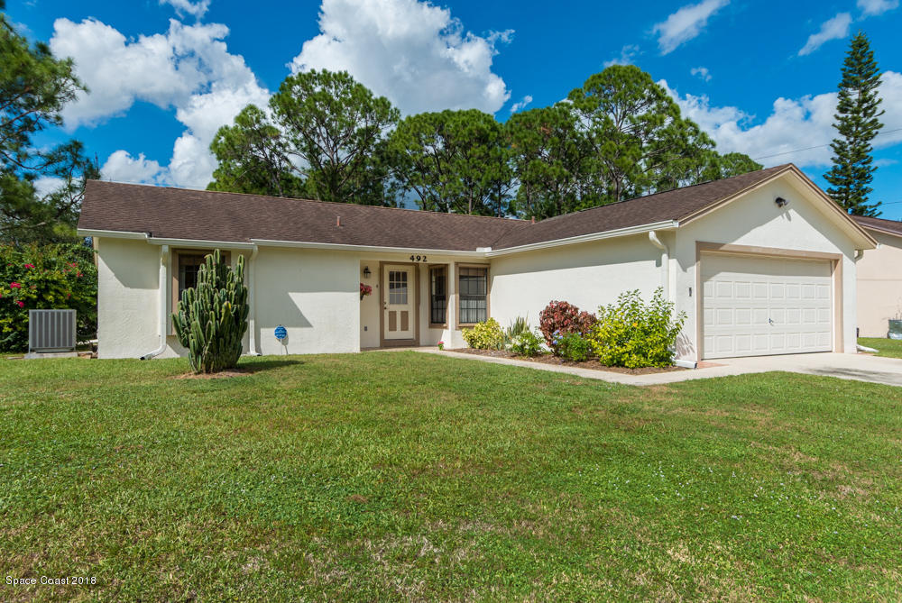 492 Warrington Road Southwest Palm Bay, FL 32908 - Photo 1 of 18 Front view.