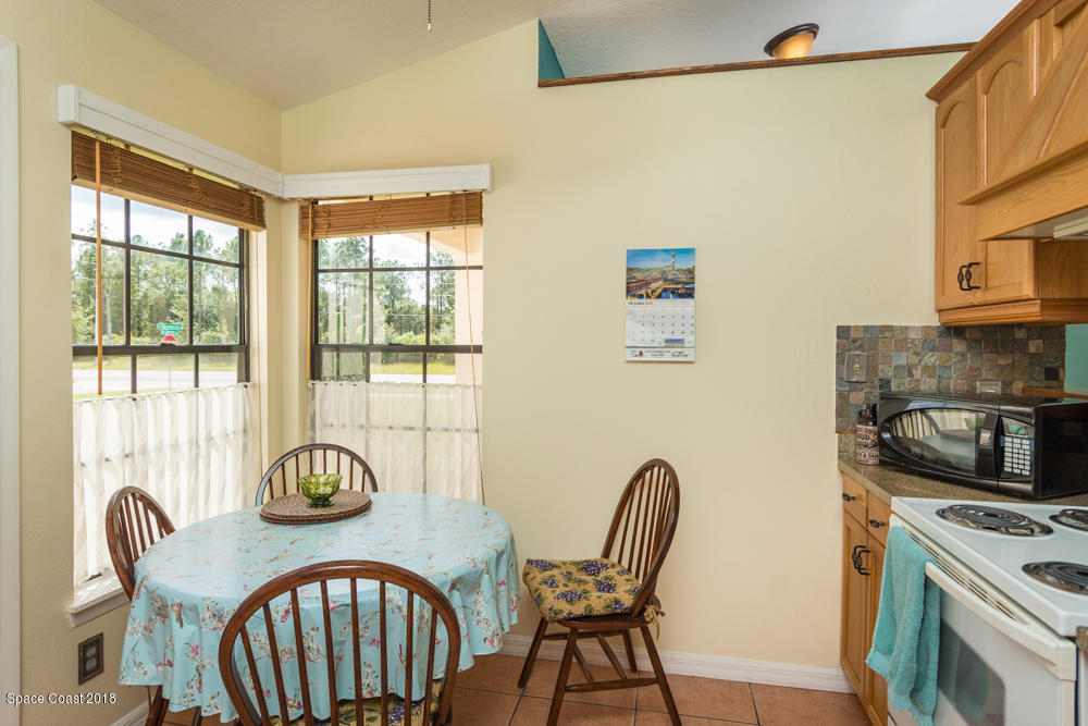 492 Warrington Road Southwest Palm Bay, FL 32908 - Photo 11 of 18 Kitchen breakfast area.