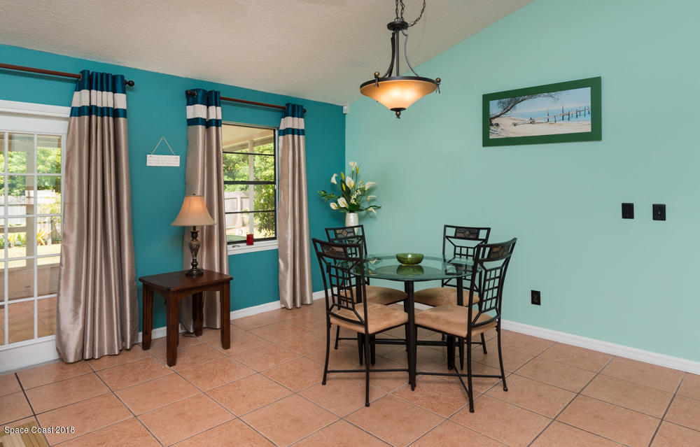 492 Warrington Road Southwest Palm Bay, FL 32908 - Photo 13 of 18 Formal dining area.