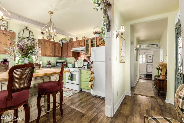 a view of a kitchen and dining room