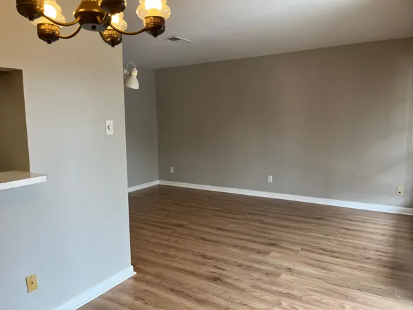 a bathroom with a sink a toilet and bathtub