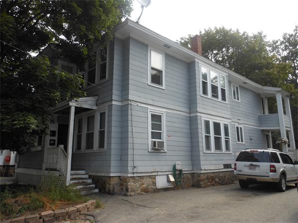 27-29 Dufton Road Andover, MA 01810 - Photo 1 of 12 a car parked in front of a building