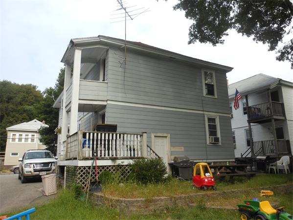 27-29 Dufton Road Andover, MA 01810 - Photo 2 of 12 a front view of a house with garden