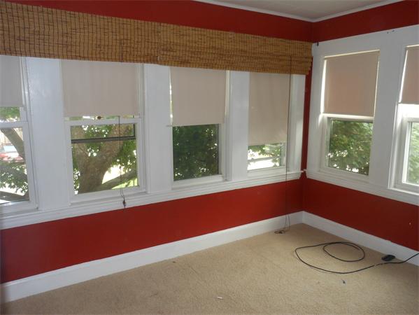 27-29 Dufton Road Andover, MA 01810 - Photo 4 of 12 a view of a livingroom with a window and tub