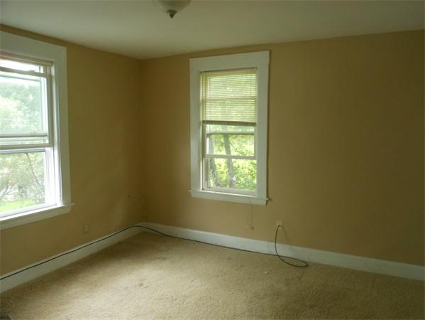 27-29 Dufton Road Andover, MA 01810 - Photo 8 of 12 an empty room with a window