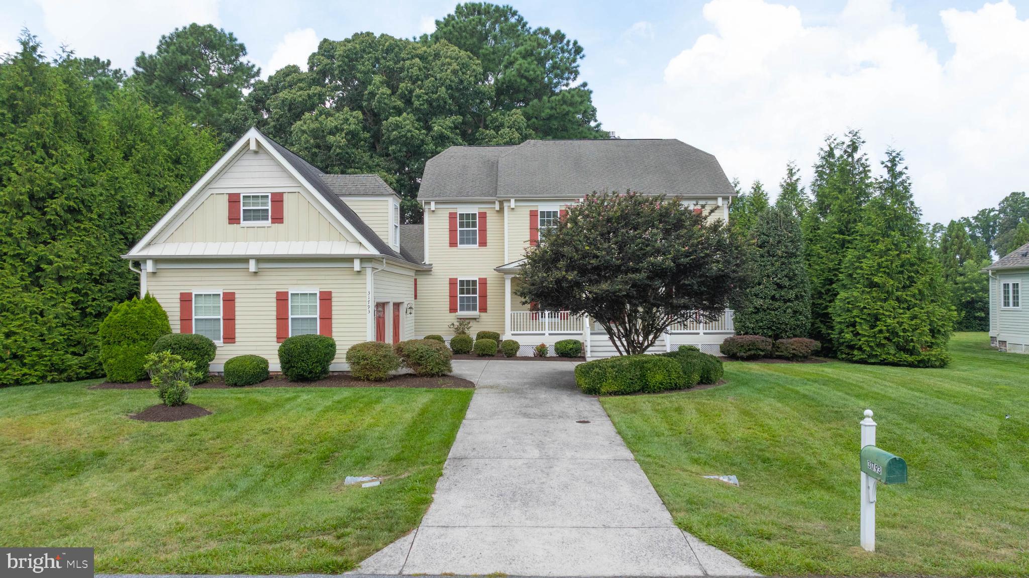 a view of house with garden