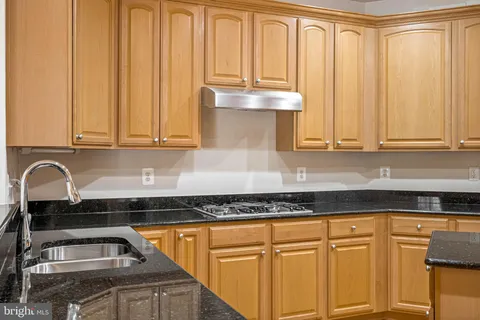 a view of an empty room with a fireplace