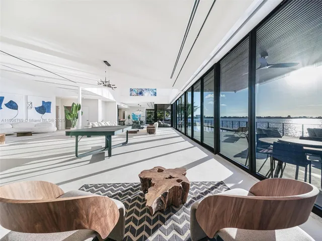 a view of a terrace with furniture and a table