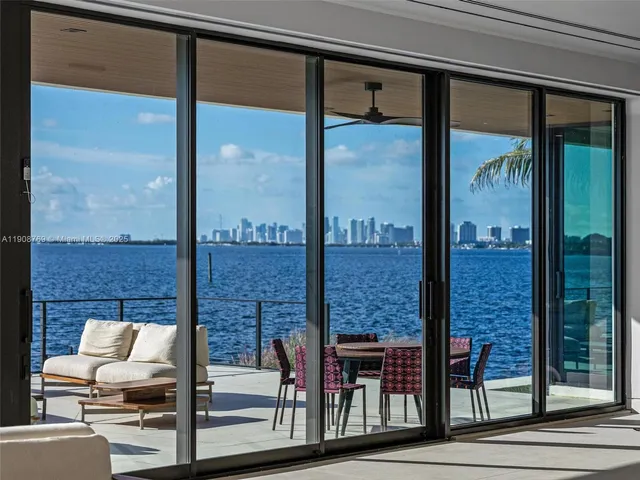 a view of a balcony with an ocean view