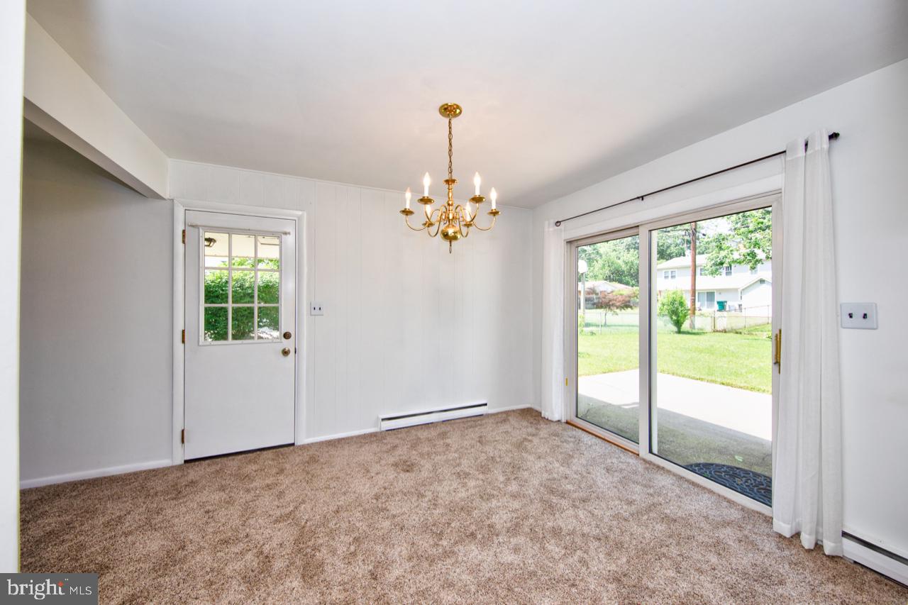 807 Falconer Road Joppa, MD 21085 - Photo 7 of 22 Dining area with sliders leading to backyard