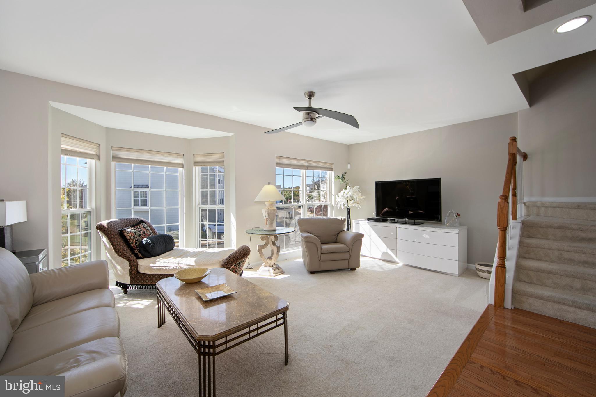 27 Firethorn Lane Riverside, NJ 08075 - Photo 15 of 43 a living room with furniture and a flat screen tv