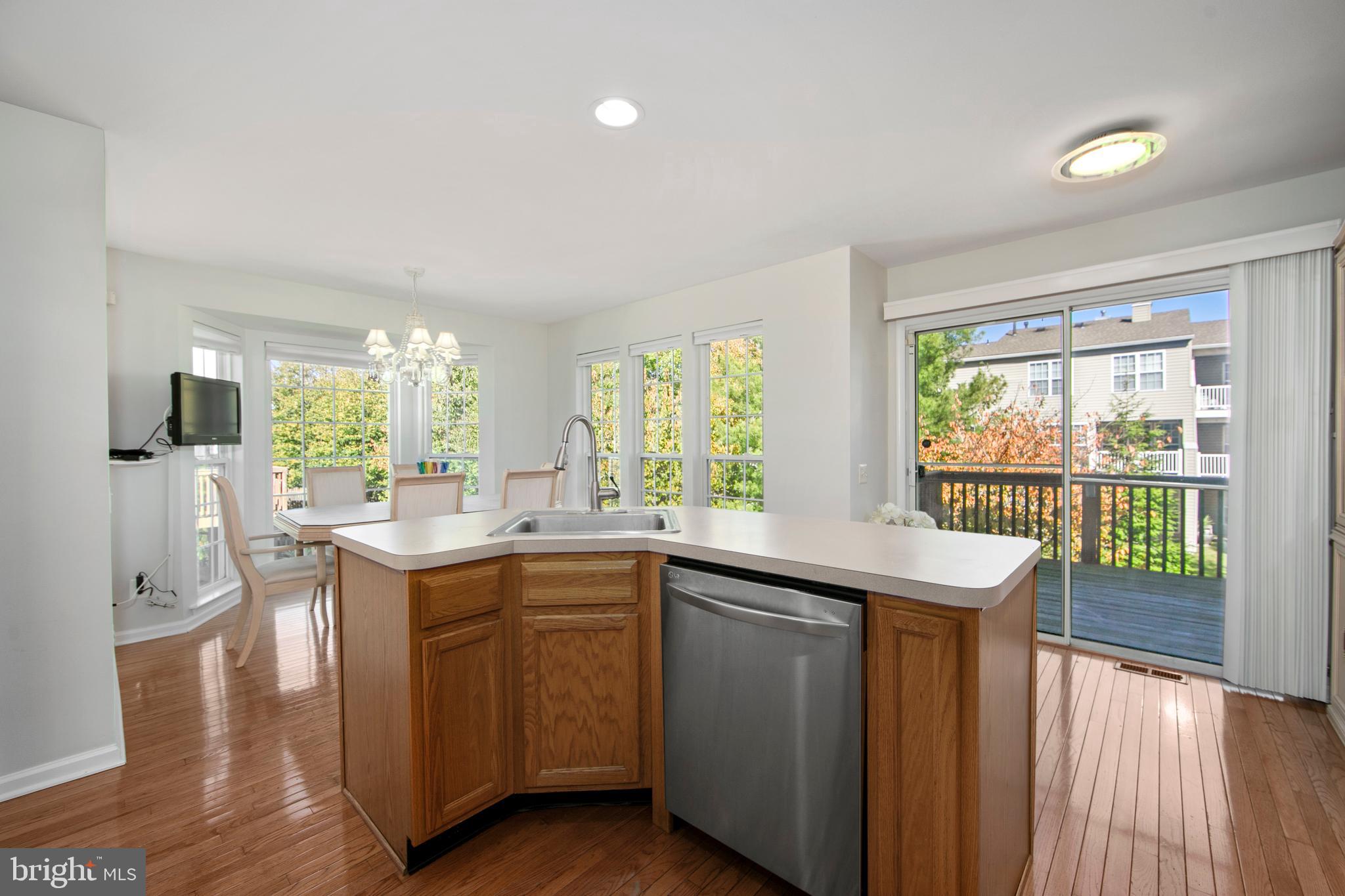 27 Firethorn Lane Riverside, NJ 08075 - Photo 2 of 43 a kitchen with a sink and wooden floor