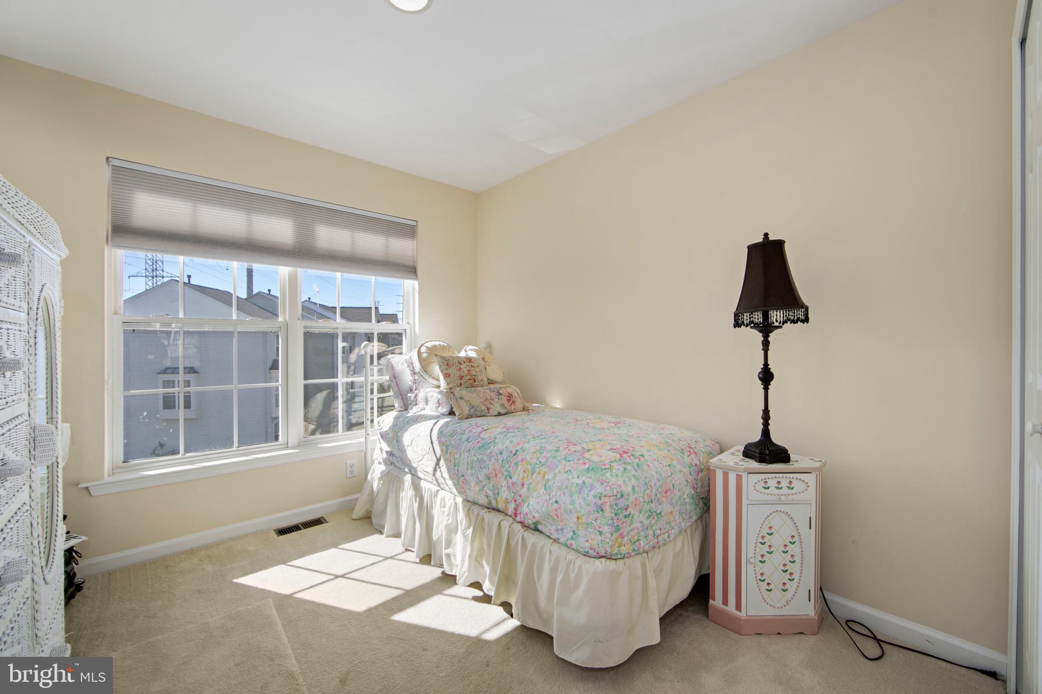 27 Firethorn Lane Riverside, NJ 08075 - Photo 25 of 43 a living room with furniture and a window