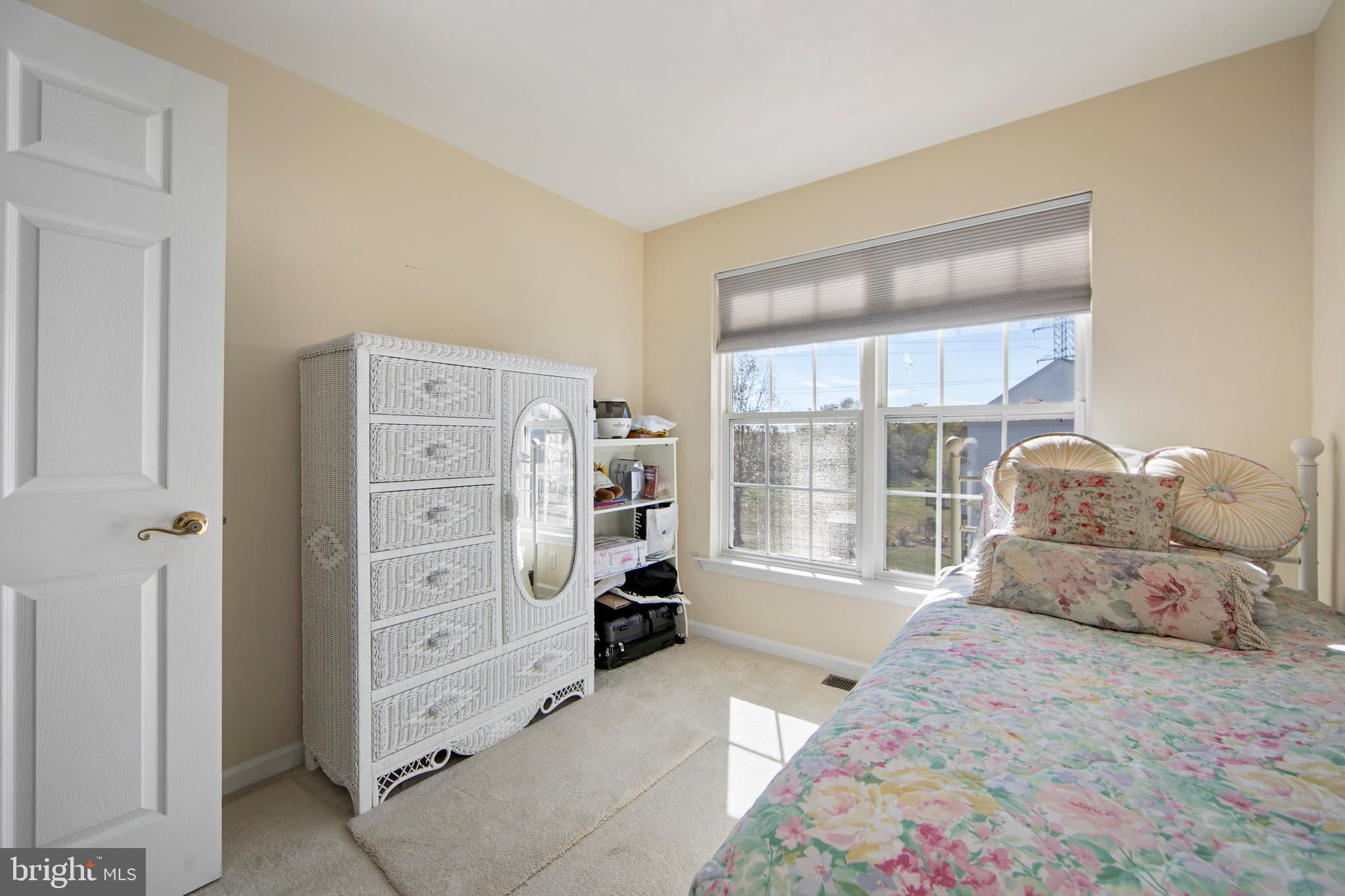 27 Firethorn Lane Riverside, NJ 08075 - Photo 26 of 43 a bedroom with a bed and a large window