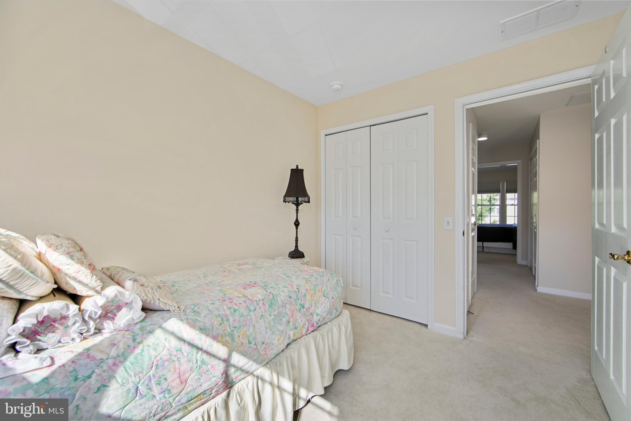 27 Firethorn Lane Riverside, NJ 08075 - Photo 27 of 43 a bedroom with a bed and walk in closet