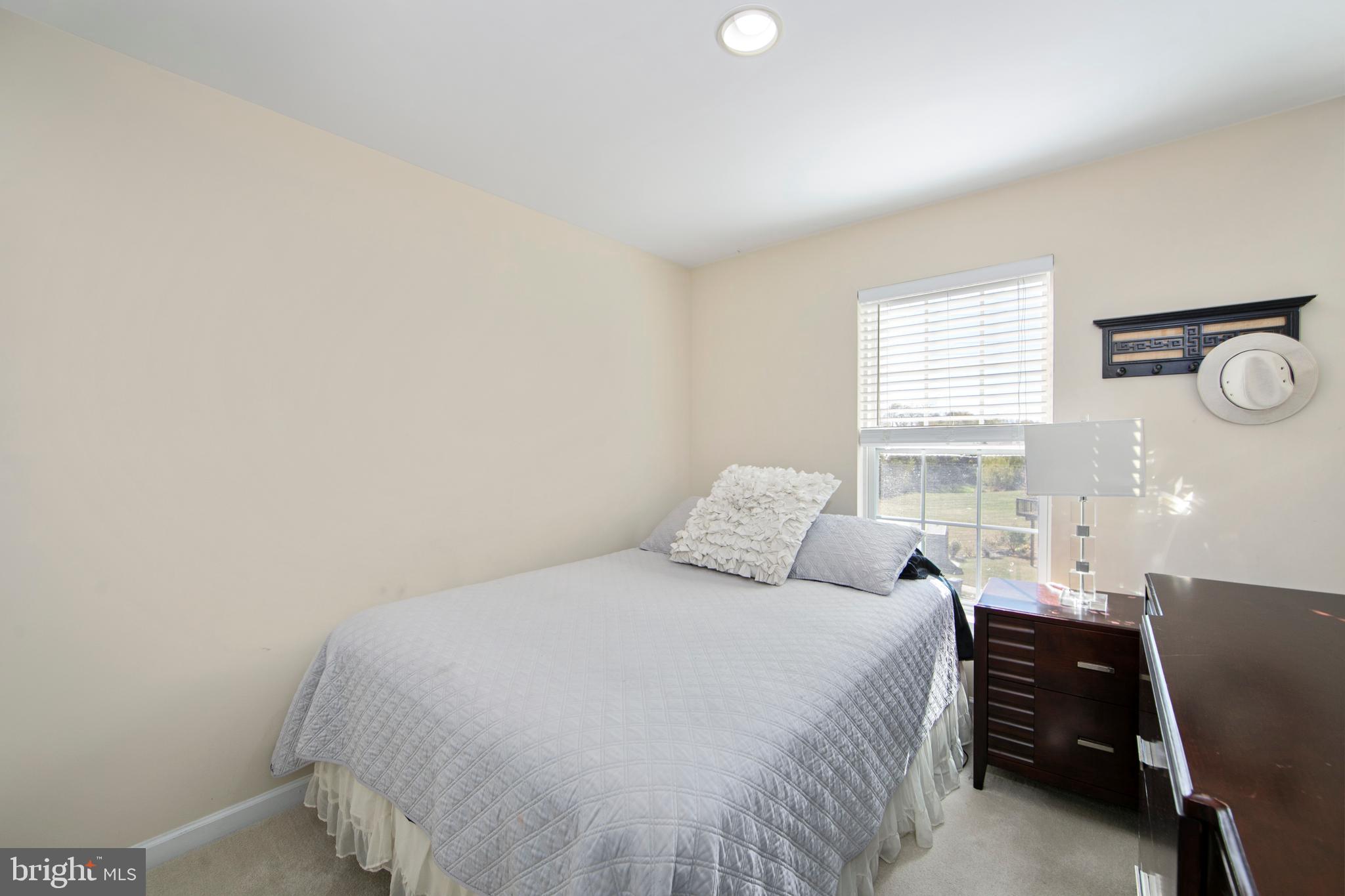 27 Firethorn Lane Riverside, NJ 08075 - Photo 28 of 43 a bedroom with a bed and window