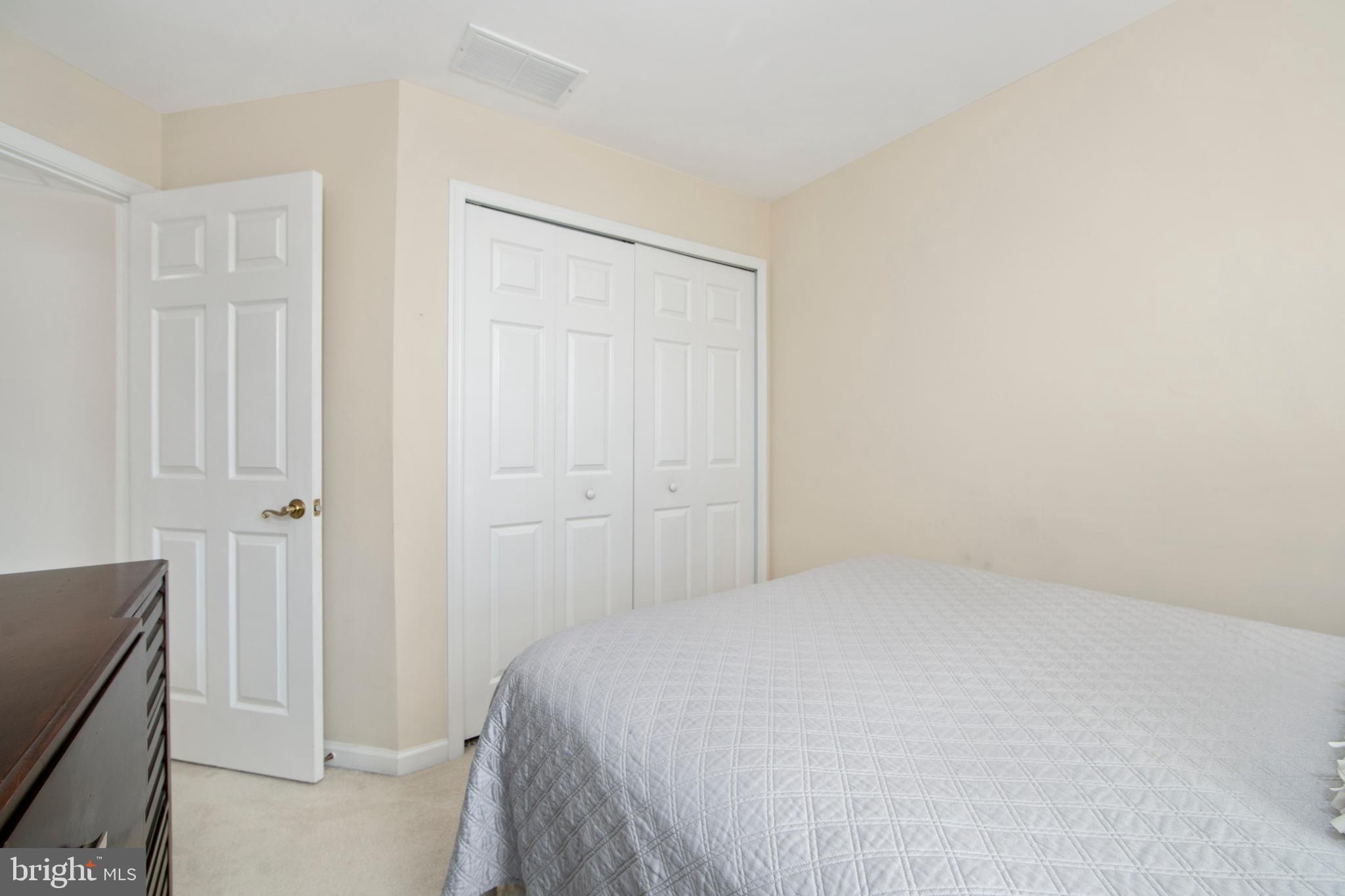 27 Firethorn Lane Riverside, NJ 08075 - Photo 30 of 43 a bedroom with a bed and a shower