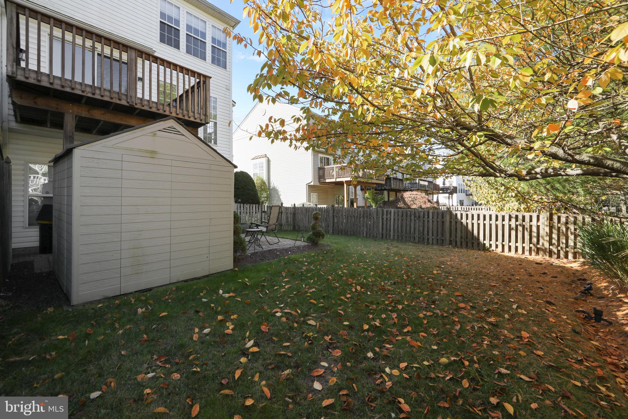 27 Firethorn Lane Riverside, NJ 08075 - Photo 34 of 43 a view of a pathway of a house with wooden fence