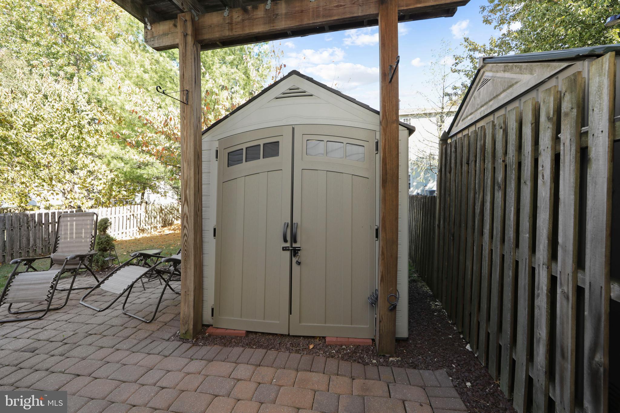 27 Firethorn Lane Riverside, NJ 08075 - Photo 36 of 43 a view of a porch with chairs and yard
