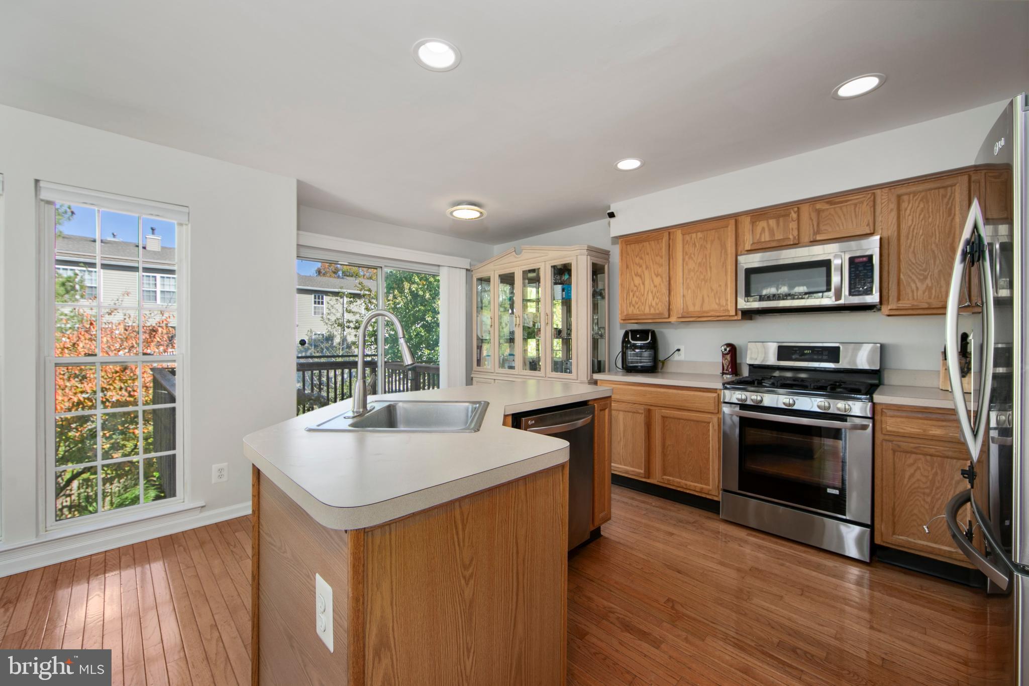 27 Firethorn Lane Riverside, NJ 08075 - Photo 4 of 43 a kitchen with a sink appliances cabinets and a window