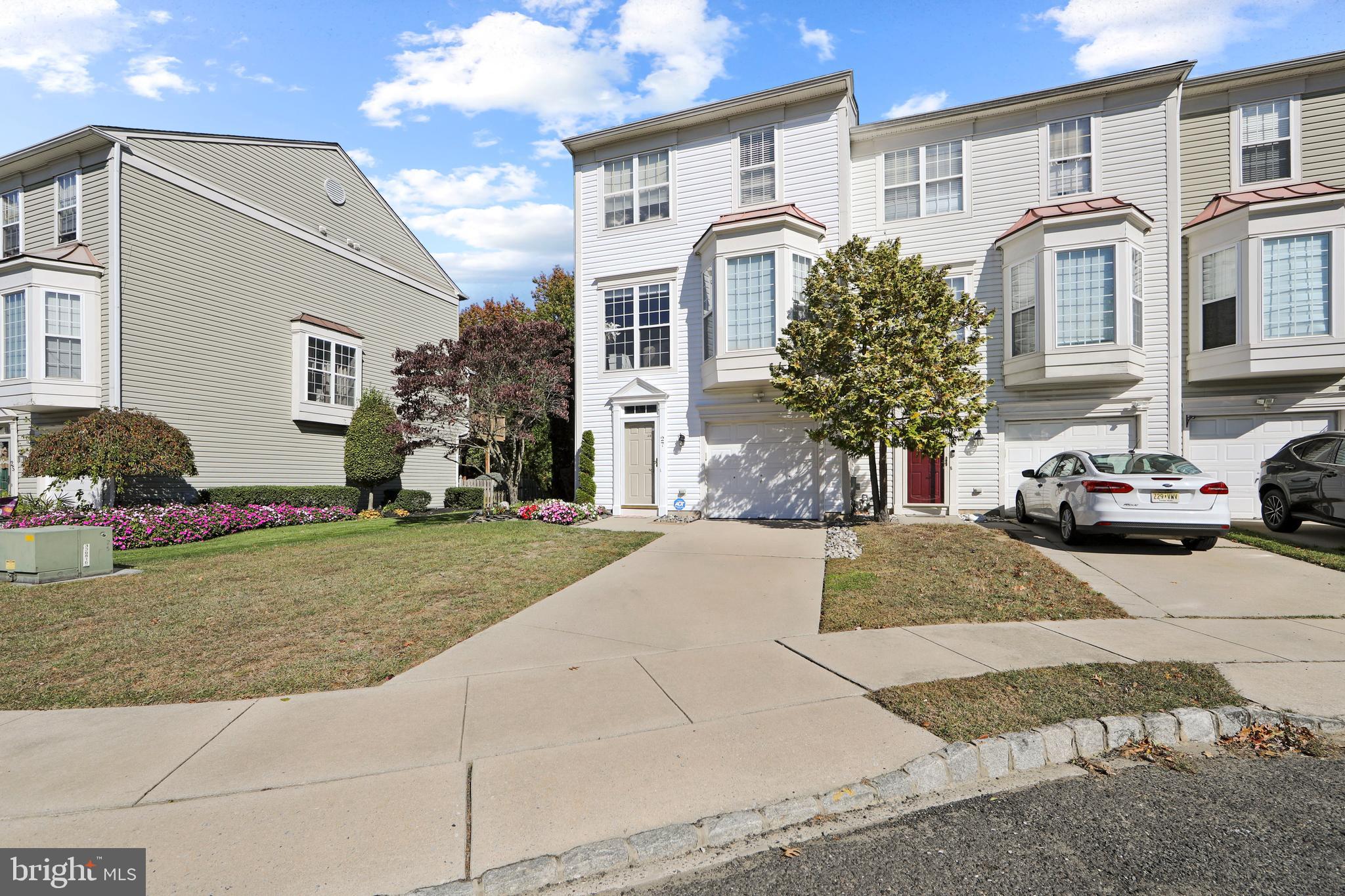 27 Firethorn Lane Riverside, NJ 08075 - Photo 42 of 43 a front view of a house with a yard