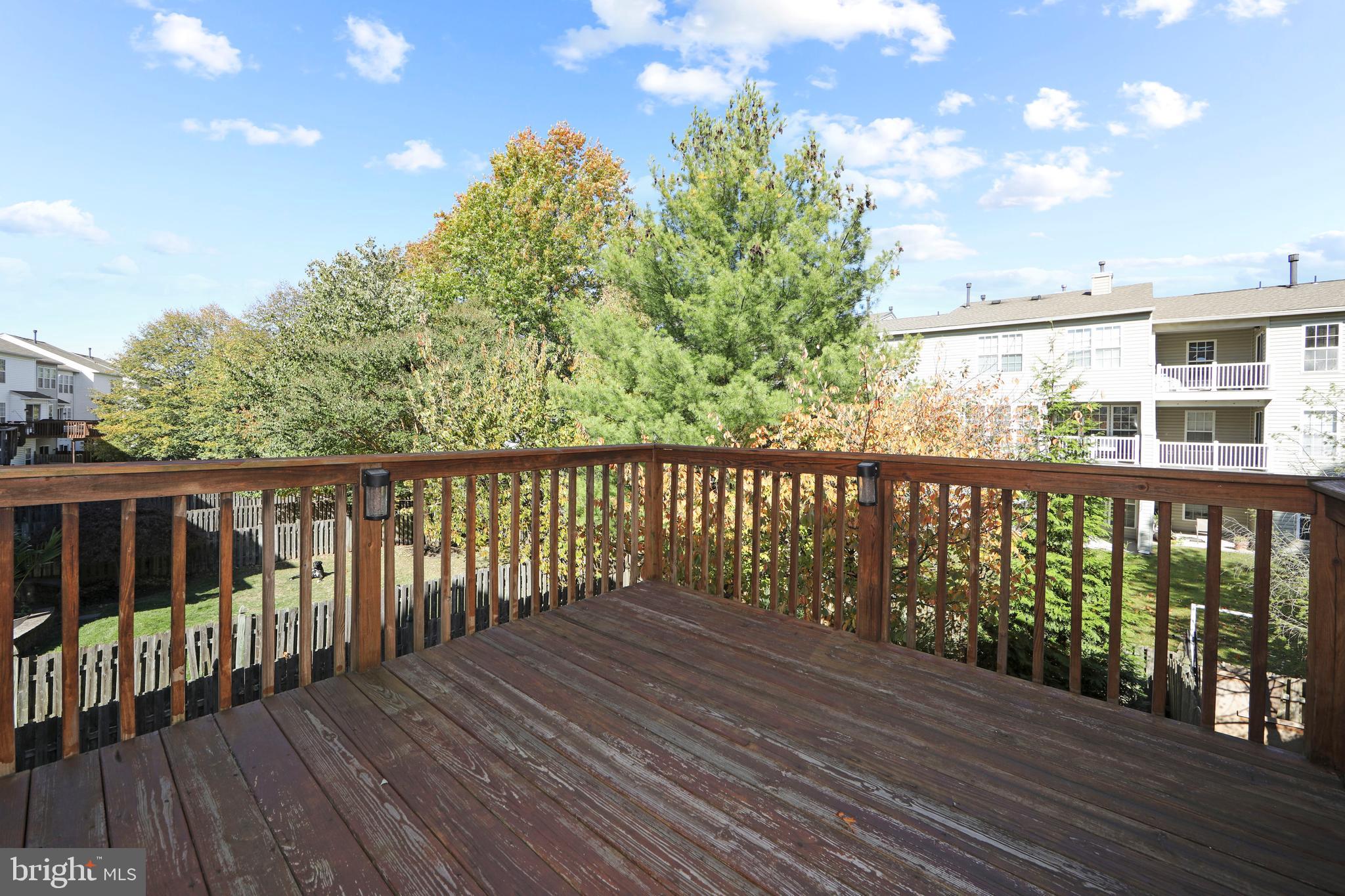 27 Firethorn Lane Riverside, NJ 08075 - Photo 8 of 43 a balcony with wooden floor and fence