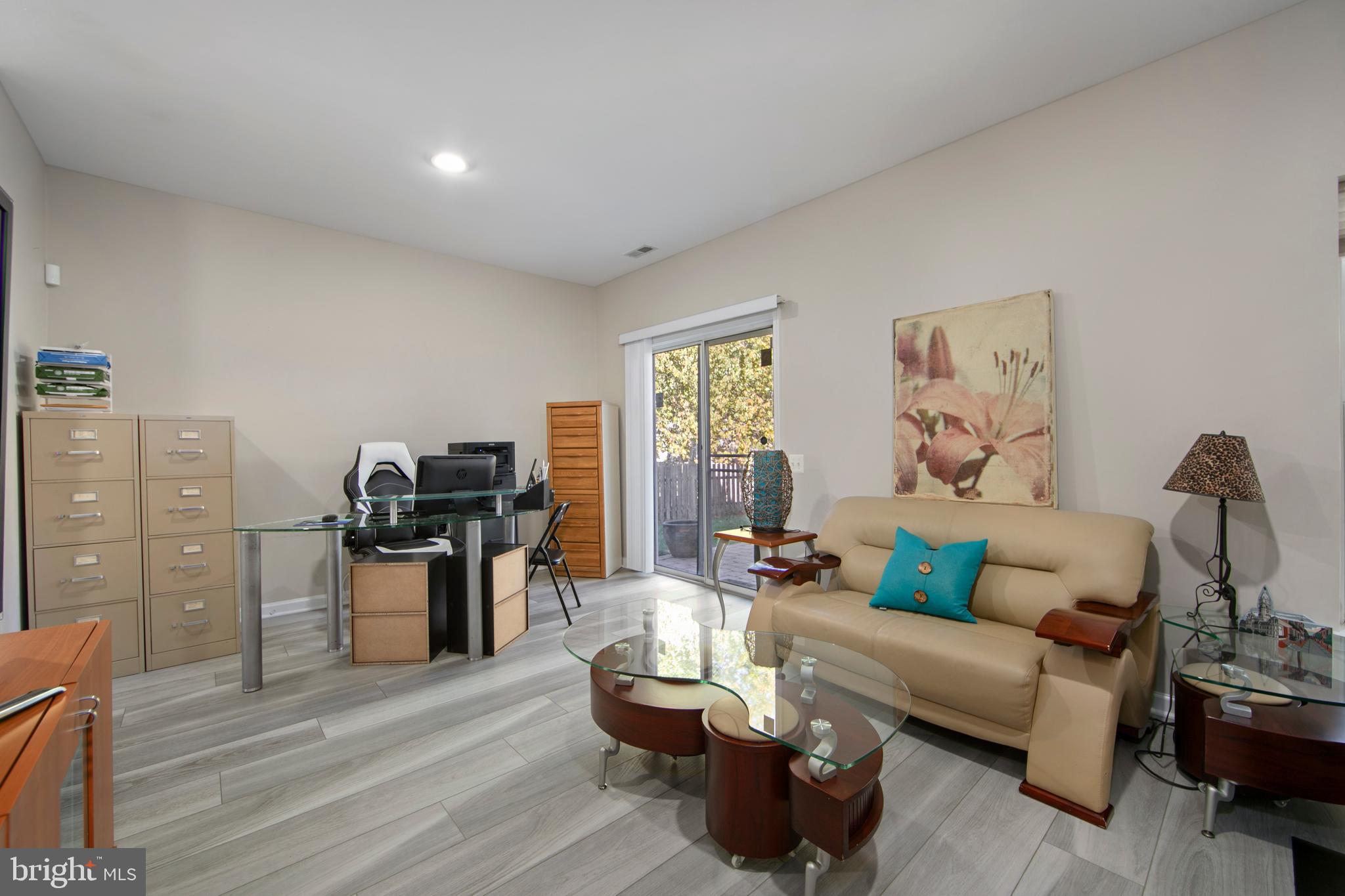 27 Firethorn Lane Riverside, NJ 08075 - Photo 10 of 43 a living room with furniture or couch and a flat screen tv