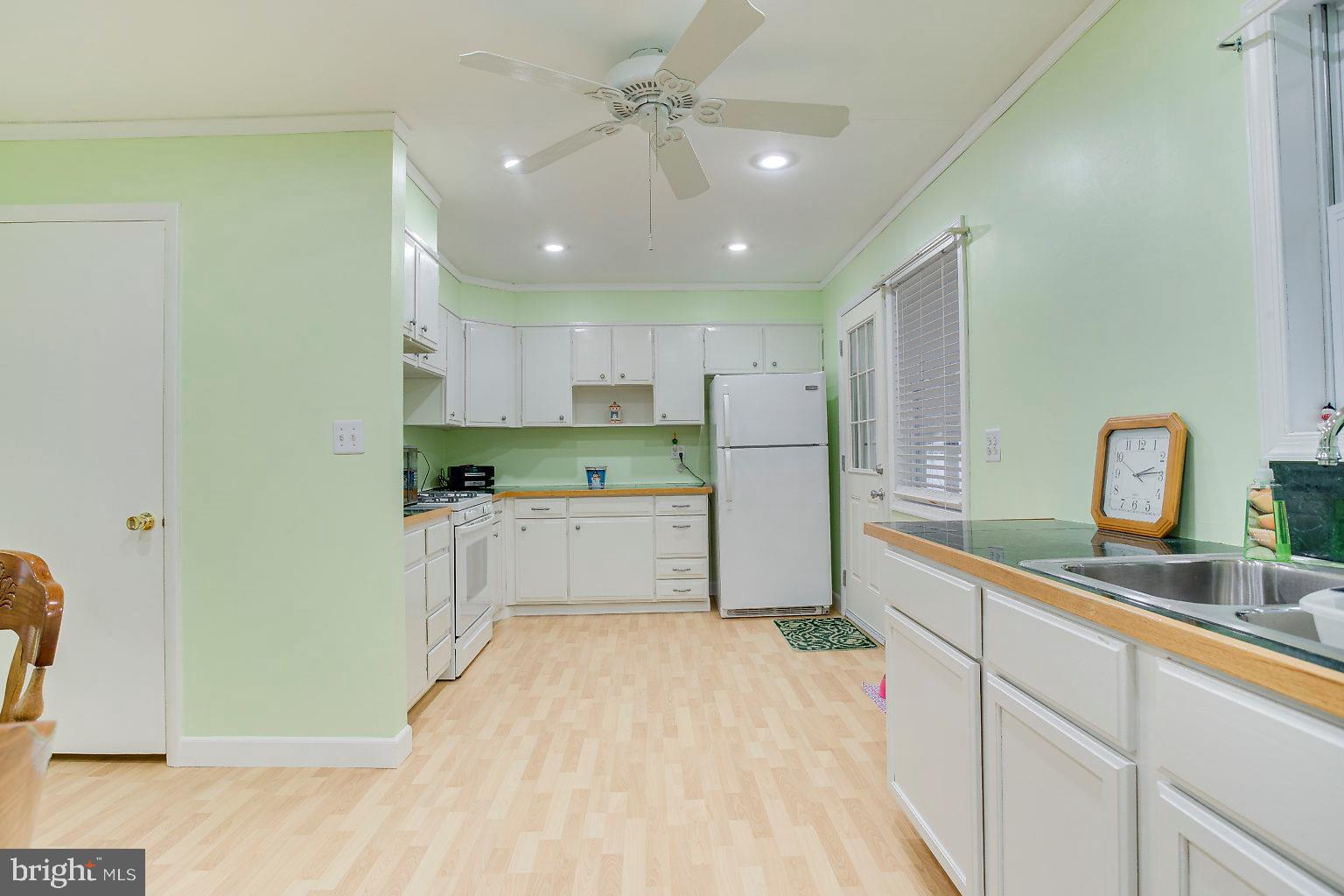 1248 Sulphur Spring Road Baltimore, MD 21227 - Photo 16 of 28 Recessed lights in the kitchen