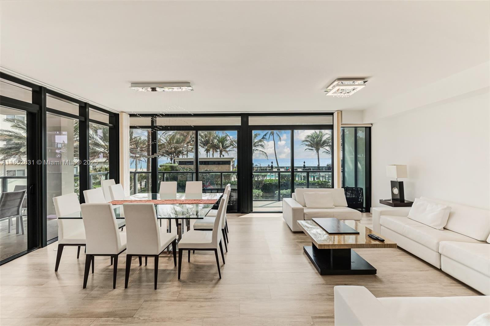 2101 South Surf Road, Unit 2F Hollywood, FL 33019 - Photo 21 of 70 a living room with furniture and a large window