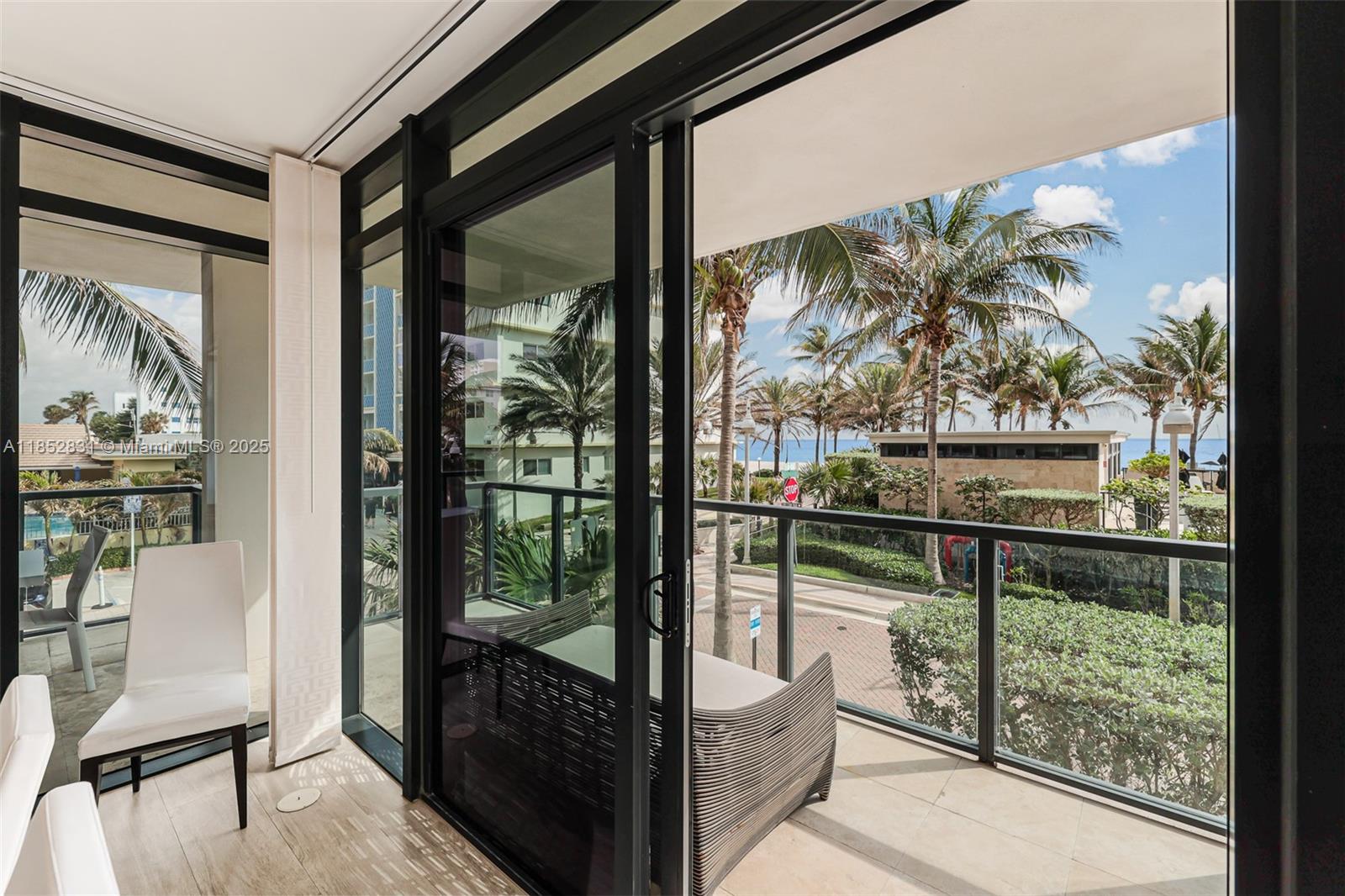 2101 South Surf Road, Unit 2F Hollywood, FL 33019 - Photo 27 of 70 a view of a glass door and a balcony