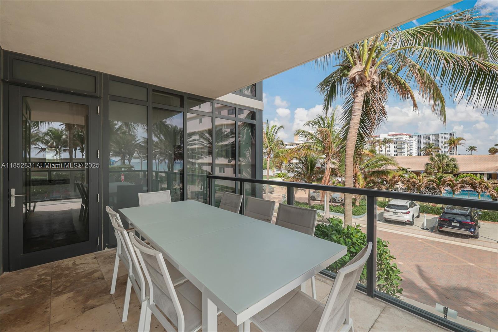 2101 South Surf Road, Unit 2F Hollywood, FL 33019 - Photo 34 of 70 a view of a dining room with a table and chairs