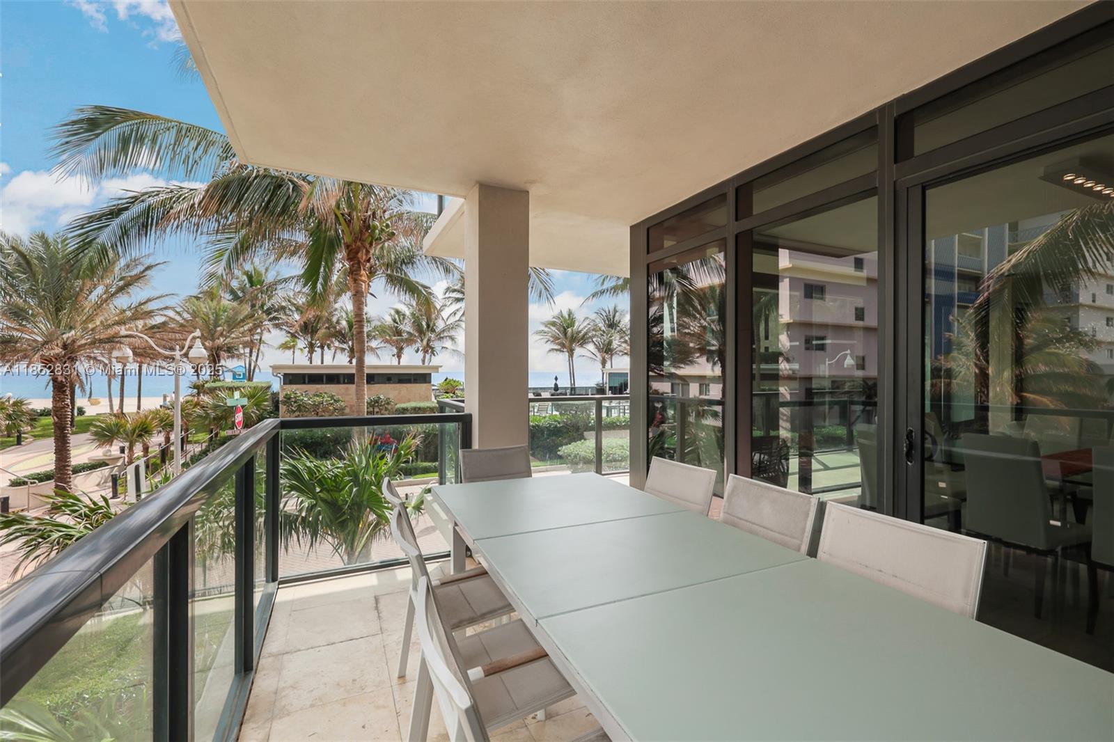 2101 South Surf Road, Unit 2F Hollywood, FL 33019 - Photo 36 of 70 a balcony with table and chairs