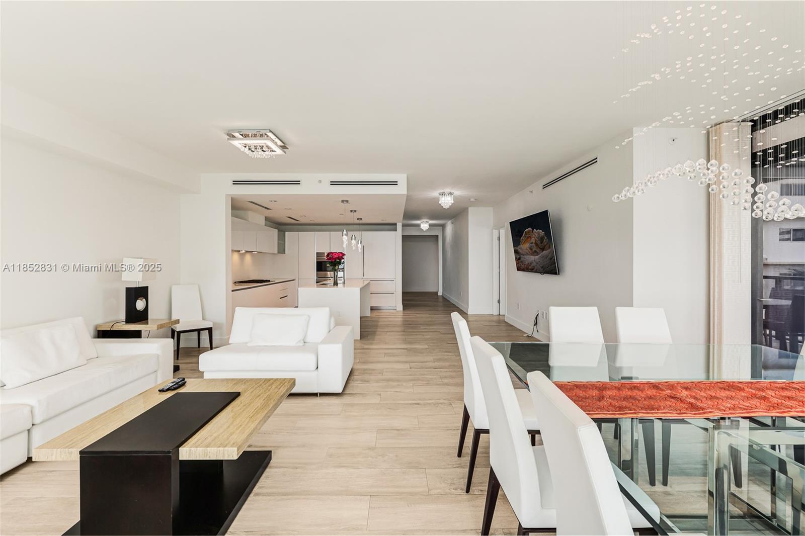 2101 South Surf Road, Unit 2F Hollywood, FL 33019 - Photo 43 of 70 a living room with furniture and a flat screen tv