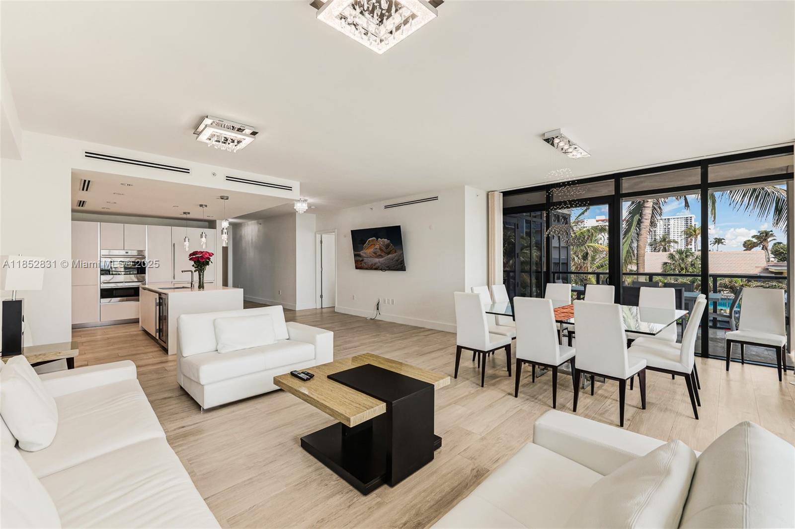 2101 South Surf Road, Unit 2F Hollywood, FL 33019 - Photo 44 of 70 a living room with furniture and a large window