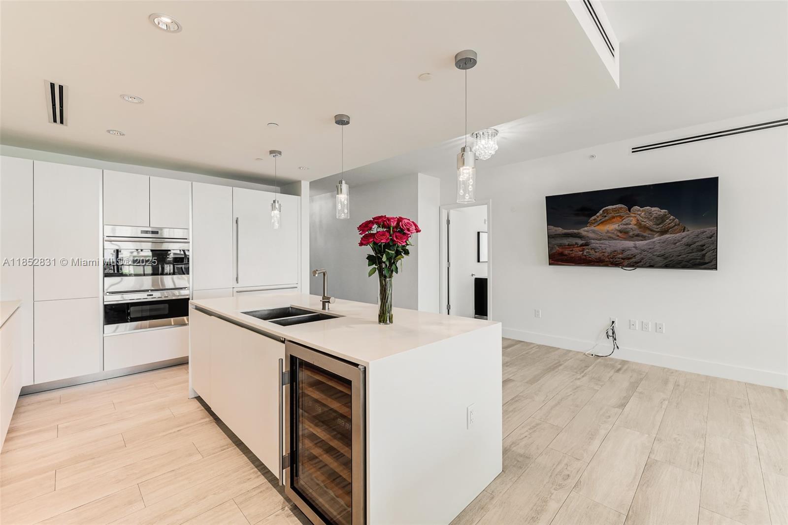 2101 South Surf Road, Unit 2F Hollywood, FL 33019 - Photo 47 of 70 a kitchen with a sink and cabinets