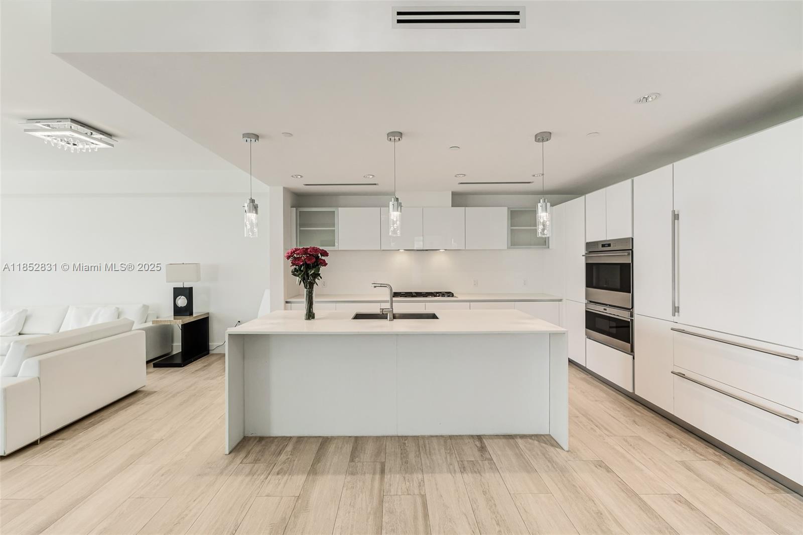 2101 South Surf Road, Unit 2F Hollywood, FL 33019 - Photo 50 of 70 a kitchen with stainless steel appliances a sink and cabinets