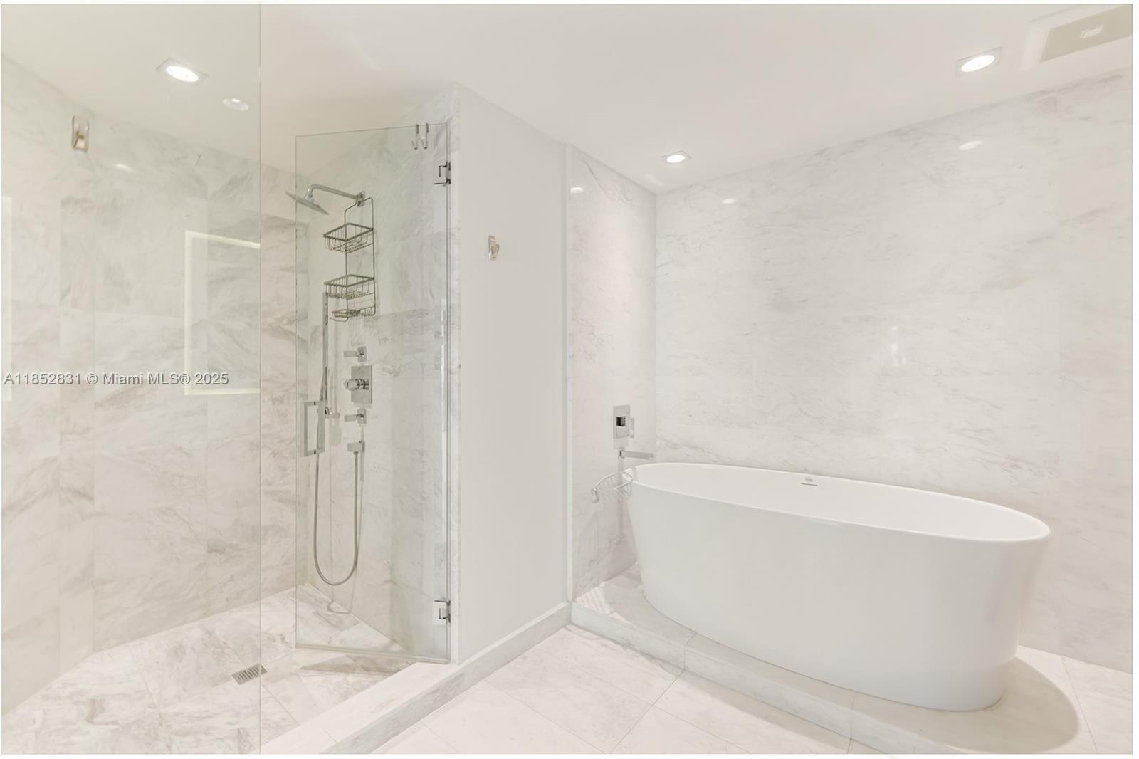 2101 South Surf Road, Unit 2F Hollywood, FL 33019 - Photo 59 of 70 a bathroom with a bathtub and shower