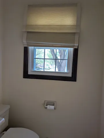 a bathroom with a toilet