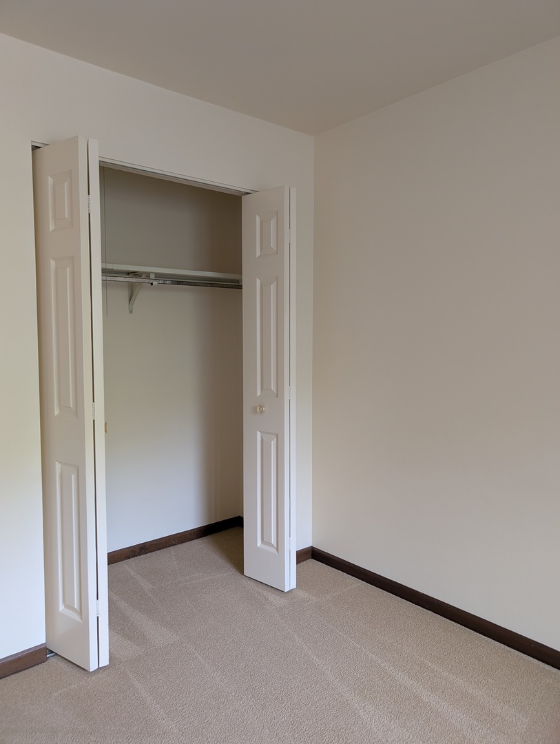 1535 Wedgefield Circle, Unit 1535 Naperville, IL 60563 - Photo 27 of 46 an empty room with a empty space