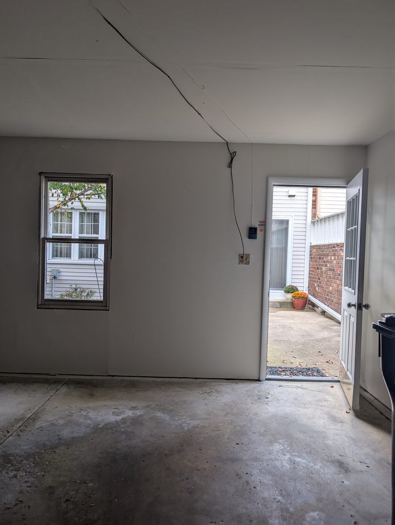 1535 Wedgefield Circle, Unit 1535 Naperville, IL 60563 - Photo 40 of 46 an empty room with windows