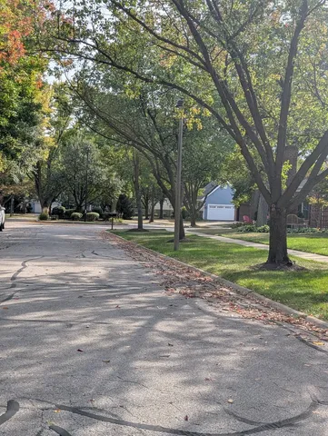 a view of a chairs and tables in the patio