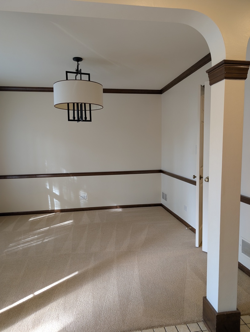 1535 Wedgefield Circle, Unit 1535 Naperville, IL 60563 - Photo 10 of 46 a view of a hallway