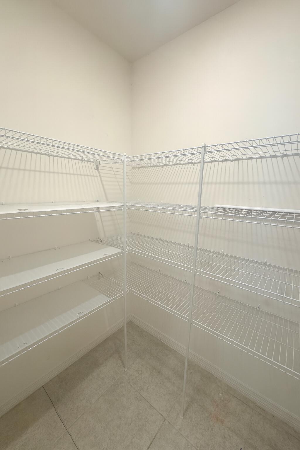 1963 Southwest Import Drive Port St. Lucie, FL 34953 - Photo 11 of 39 a bathroom with a shower