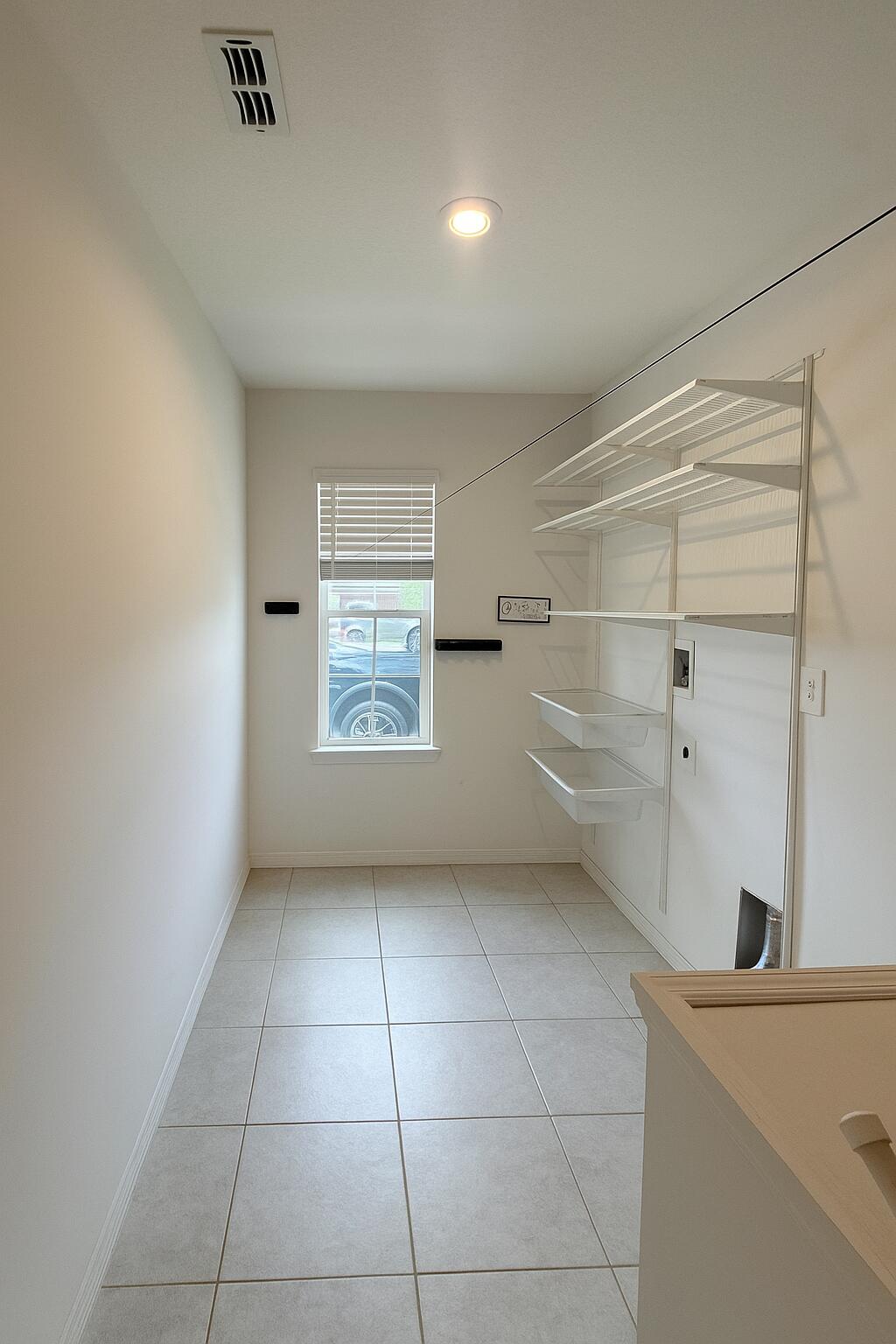 1963 Southwest Import Drive Port St. Lucie, FL 34953 - Photo 30 of 39 a view of a kitchen with a dishwasher and a sink