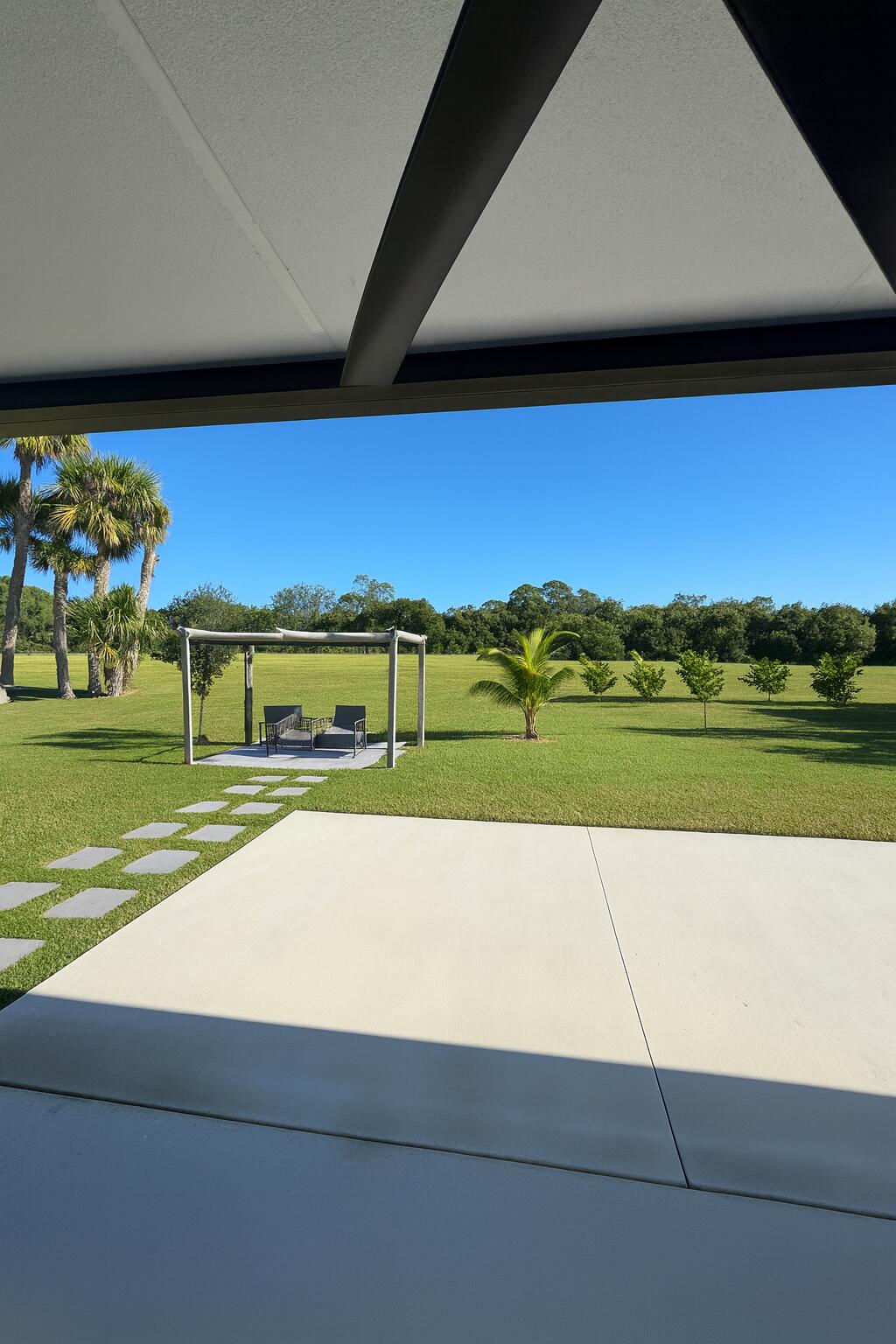 1963 Southwest Import Drive Port St. Lucie, FL 34953 - Photo 34 of 39 a view of an outdoor space and yard