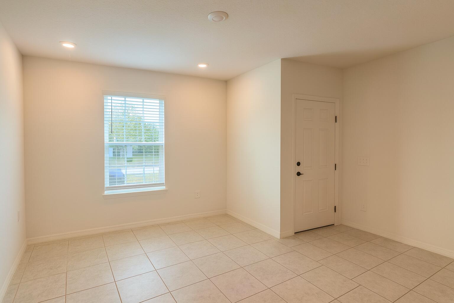1963 Southwest Import Drive Port St. Lucie, FL 34953 - Photo 37 of 39 an empty room with windows